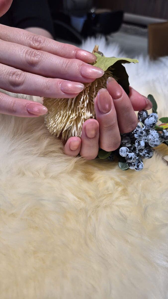 Natural pink nails with blueberries and sheepskin